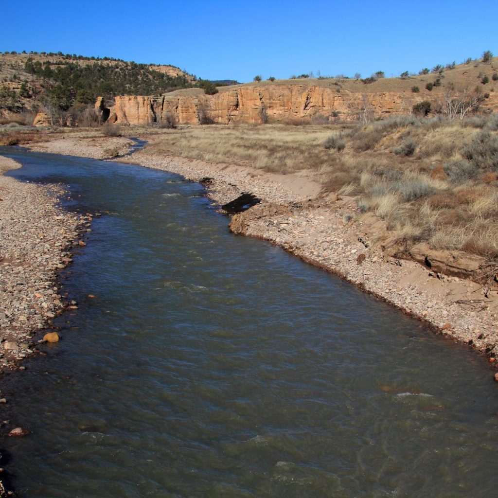 Gila river - a river in hilly desert surroundings.