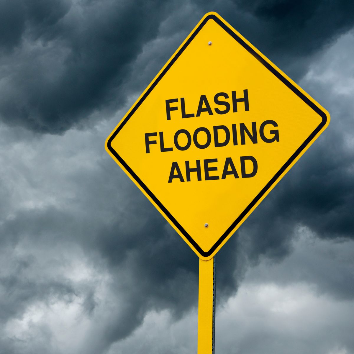 Flash flooding ahead sign.